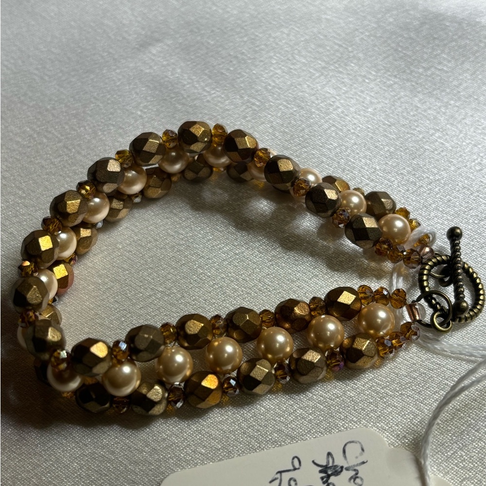Hand crafted pearl and Aztec gold beaded bracelet
